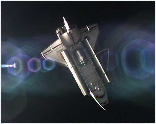 El Atlantis alejándose de la ISS - NASA TV