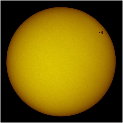 Atlantis y la ISS frente al Sol por Thierry Legault